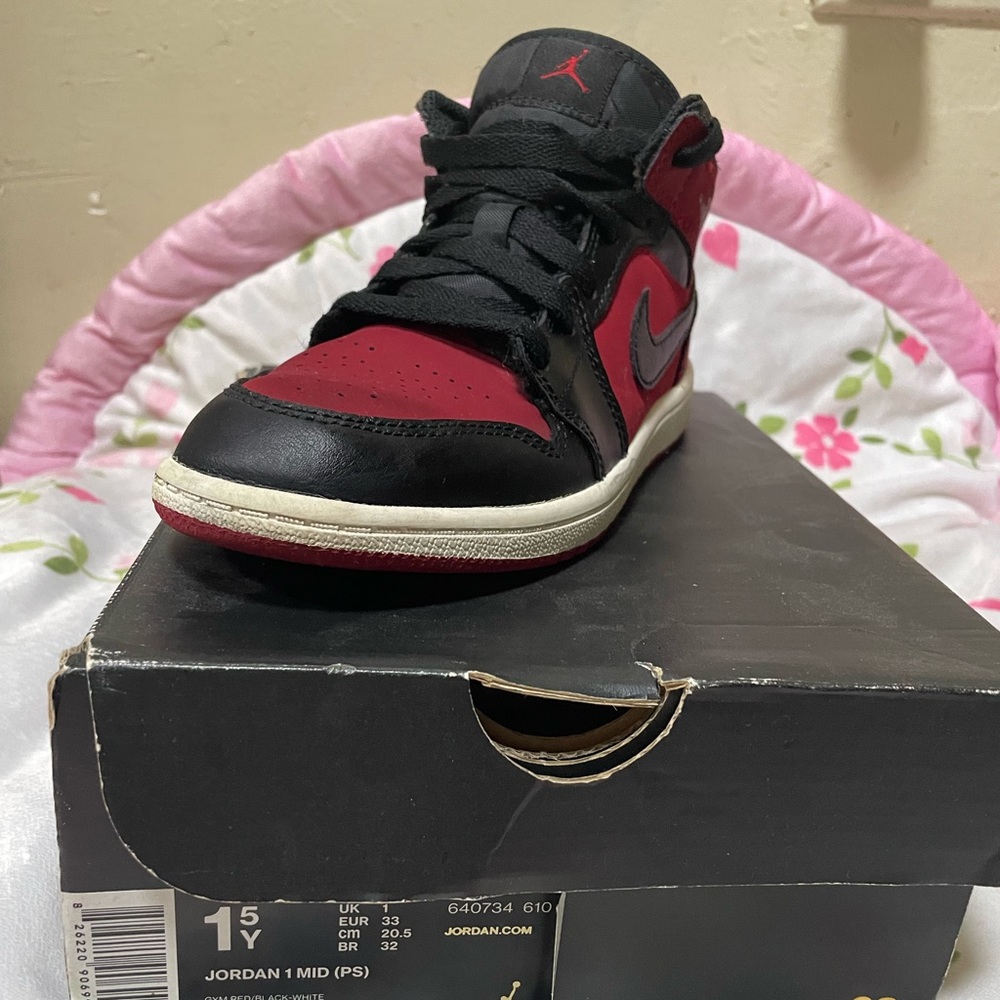 Red and black Jordan 1 mid